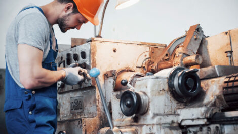 portrait-young-worker-hard-hat-large-metalworking-plant