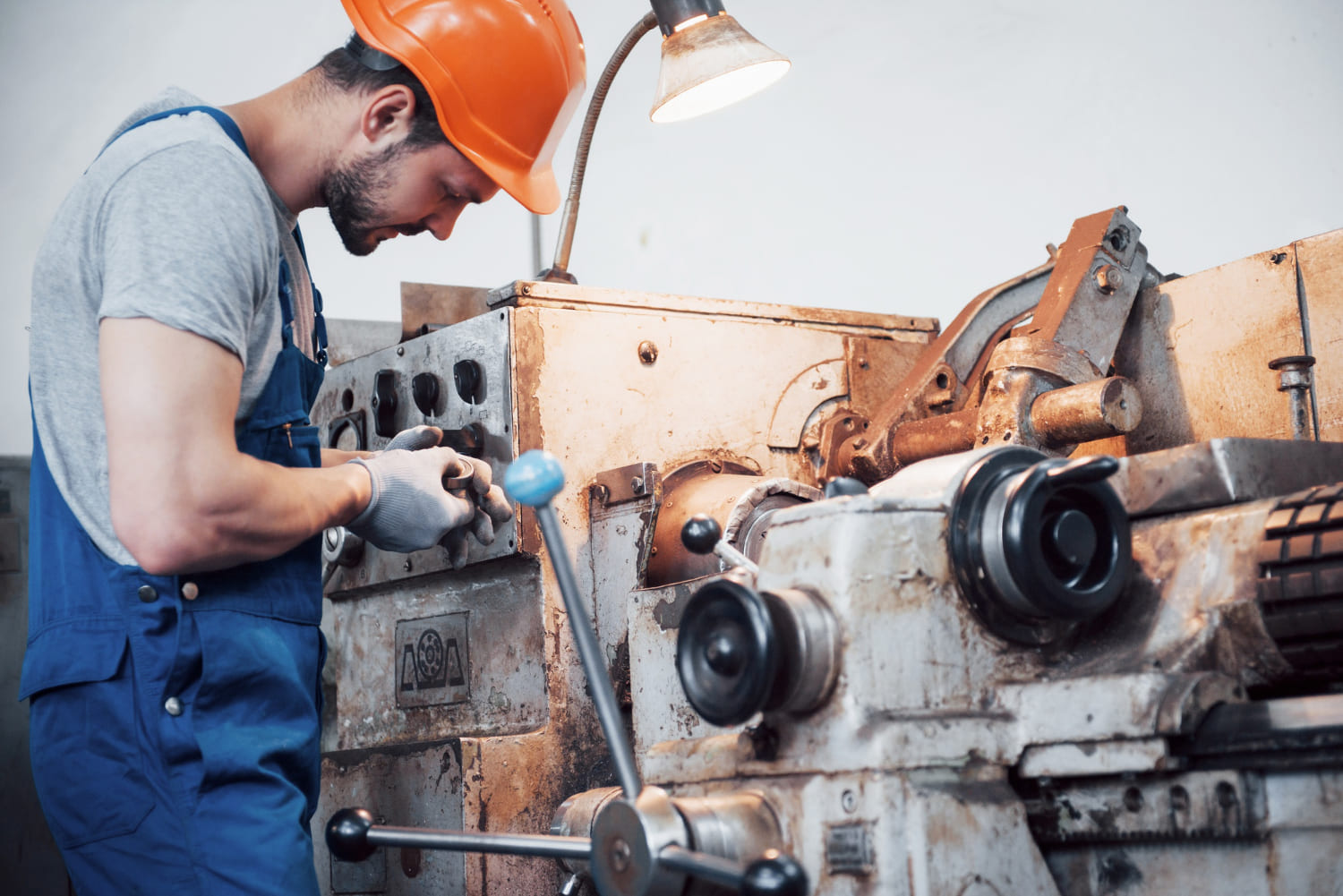 portrait-young-worker-hard-hat-large-metalworking-plant