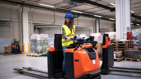 factory-worker-protective-suit-with-hardhat-driving-forklift-1-1